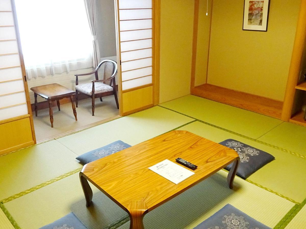 Hotel New Yokote à Yamanouchi  Extérieur photo